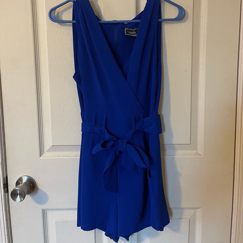 Blue romper.